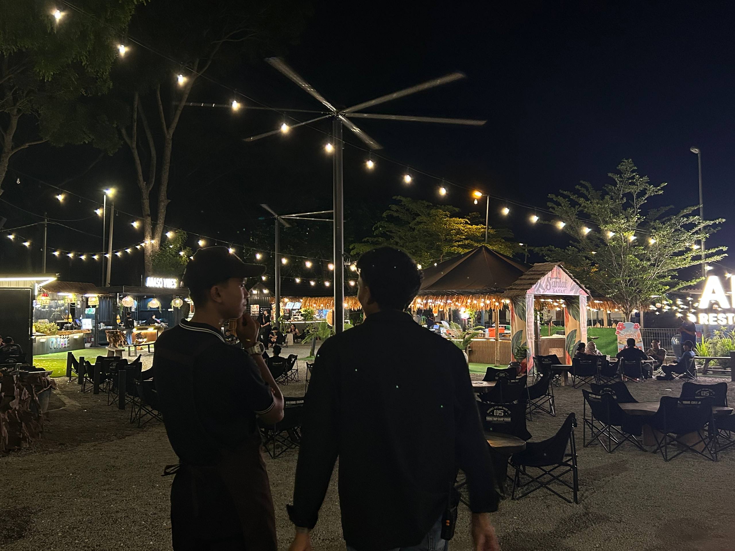 Friends spending an evening in the Araso courtyard